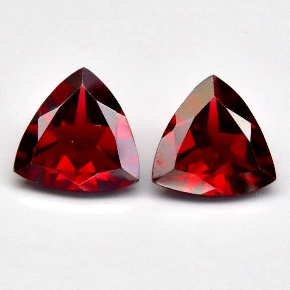 Mozambique red! 6.58ct matched trillion cut Garnet pair!