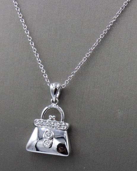 14kt White gold diamond accent purse pendant on chain