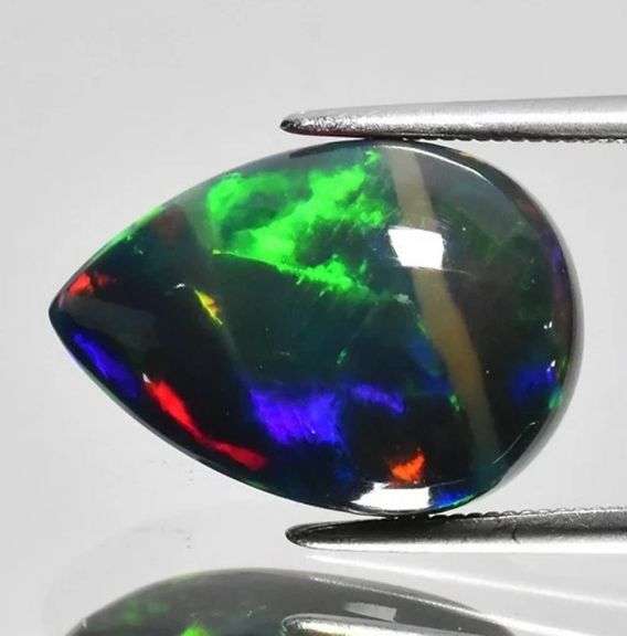 Intense full body play of color! 6.90ct Ethiopian Black Opal!!!