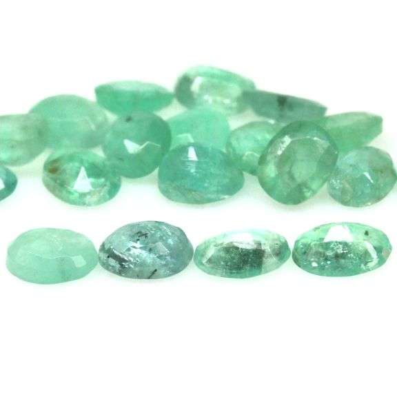 Oval cut 5.19ct 19pc Zambian Emerald set