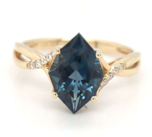 10kt Yellow gold Kite blue topaz and diamond infinity ring