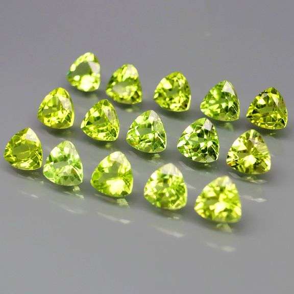 Glittering! 7.76ct 5x5mm trillion cut Peridot set