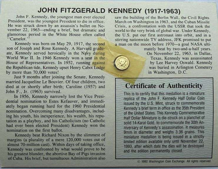 Two Solid 14 K Gold JFK Memorial Half Dollars.