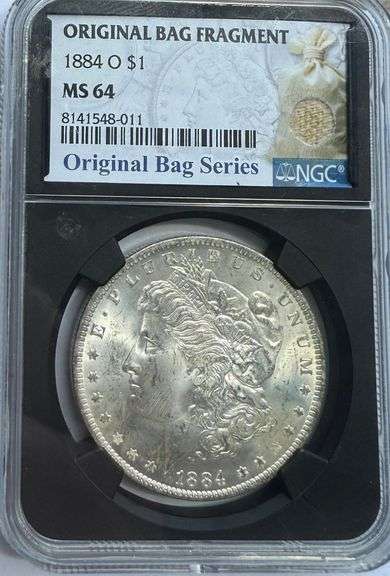1884 O NGC MS 64 Morgan Dollar.With Original Bag Fragment