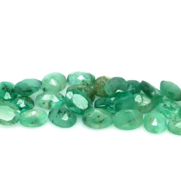 Oval cut 7.82ct 27pc Zambain Emerald set