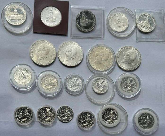 Four Ike Dollars Five Kennedy Halves & Eleven Bicentennial Quarters
