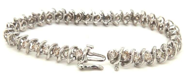 14kt White gold approximate 5.40ctw diamond S link tennis bracelet