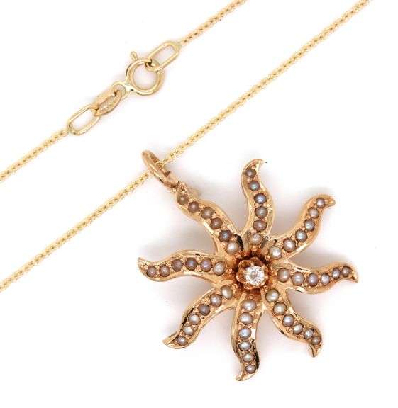 14kt Yellow gold diamond and seed pearls sunburst pendant on chain