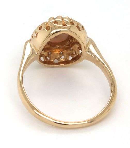 14kt Yellow gold Oval opal and diamond halo ring
