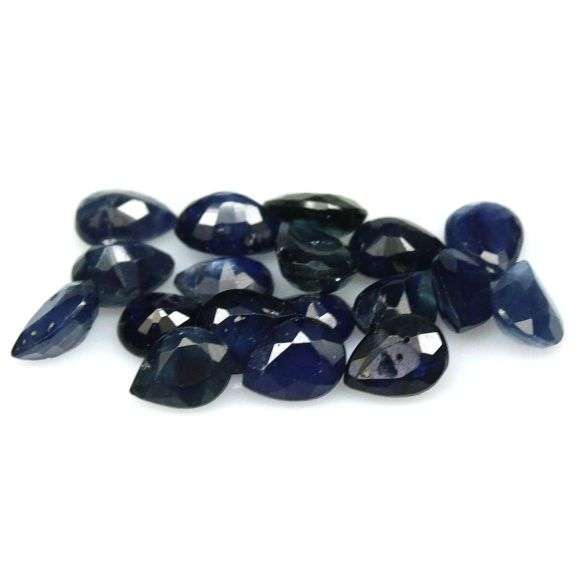 Beautifully colored 6.58ct ink blue Sapphire set
