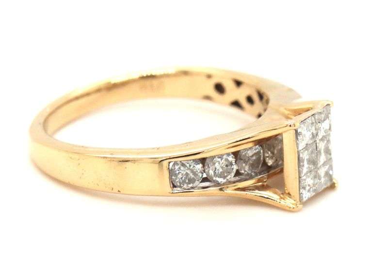 14kt Yellow gold 1ctw Invisible set diamond ring