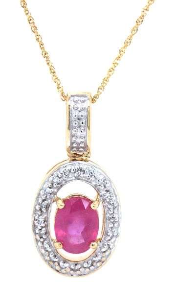 14kt Yellow gold 1.20ct oval ruby and diamond halo pendant on chain