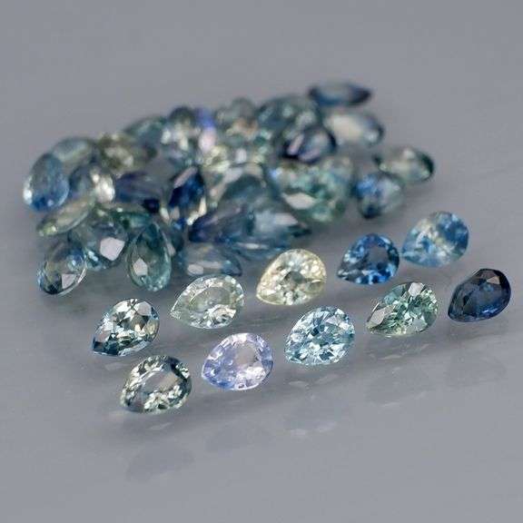 Heated only! 5.85ct blue green Sapphire set!