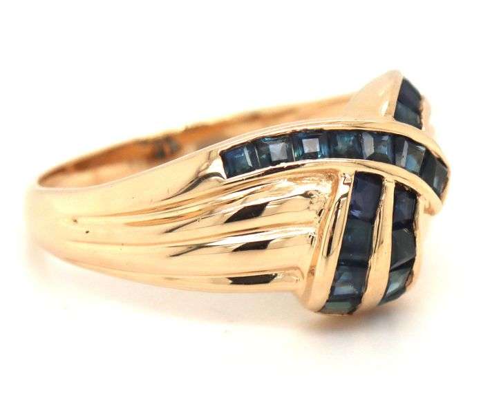 14kt Yellow gold blue sapphire channel set square cut crossover dome ring