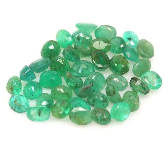 Rich emerald green 8.09ct 40pc Emerald set