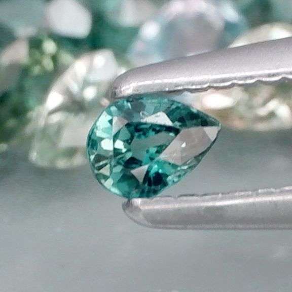 Heated only! 6.10ct blue green Sapphire set!