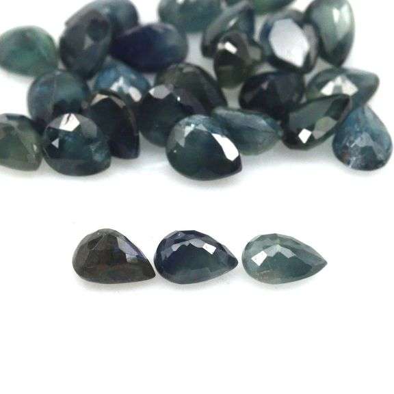 Heated only! 10.94ct blue green Sapphire set