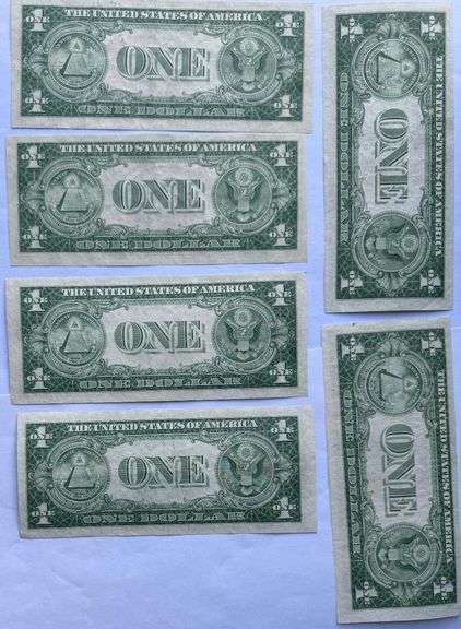 Six 1935 E & F Unc $1 Silver Certificates.