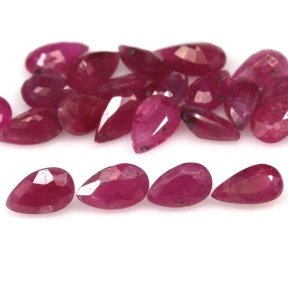 Simply gorgeous 6.93ct reddish pink Ruby set