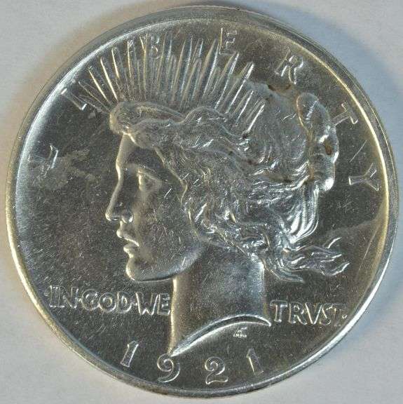 Brilliant-white 1921 Peace Silver Dollar in AU