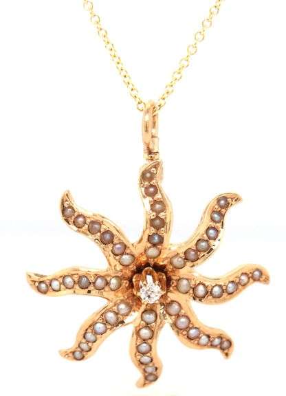 14kt Yellow gold diamond and seed pearls sunburst pendant on chain