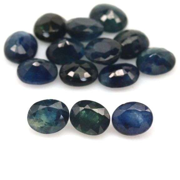 Beautifully colored 11.42ct midnight blue Sapphire set