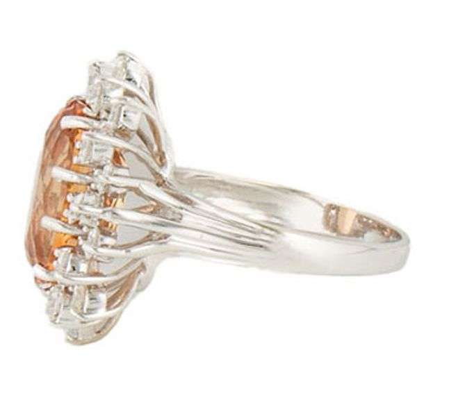 5.25ct Oval Imperial Topaz and 1.00ctw Diamond Starburst Frame Ring in 14K