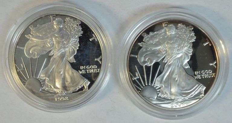 Gem Proof $1 Silver Eagles from 1998 & 2004 in velvet boxes