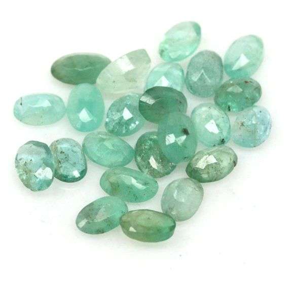 Bright emerald green 6.77ct 22pc Emerald set