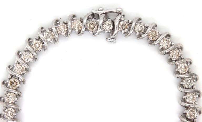 14kt White gold approximate 5.40ctw diamond S link tennis bracelet