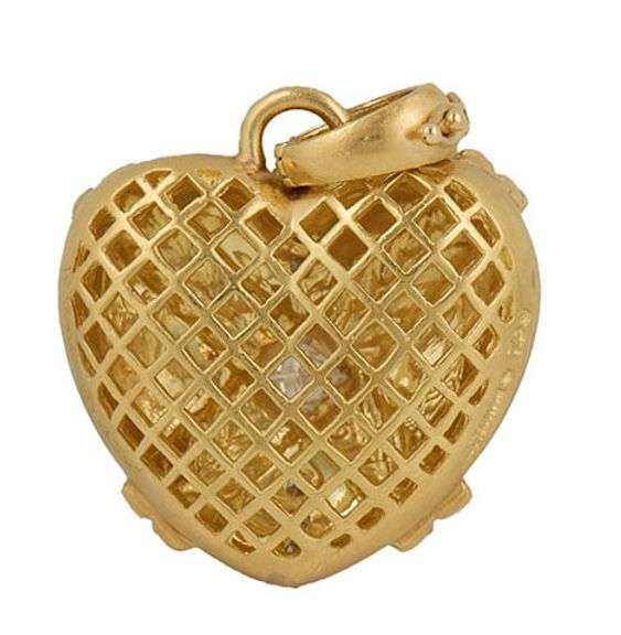 Nancy and David 0.75ctw Princess and Round Diamond X Puffed Heart Pendant in 18K