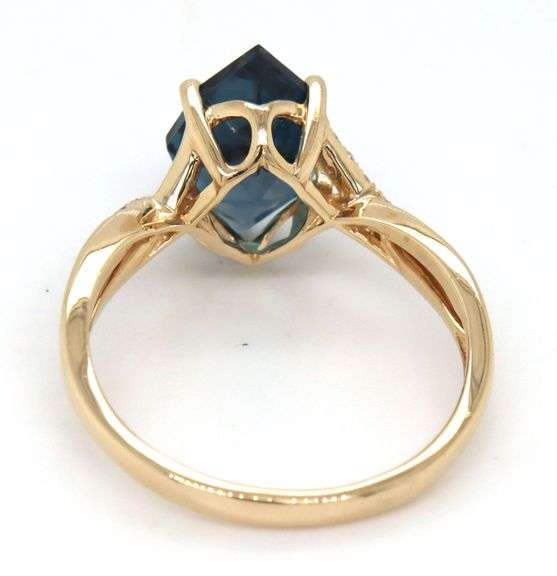 10kt Yellow gold Kite blue topaz and diamond infinity ring
