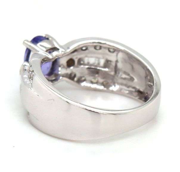 14kt White gold oval tanzanite and diamond ring