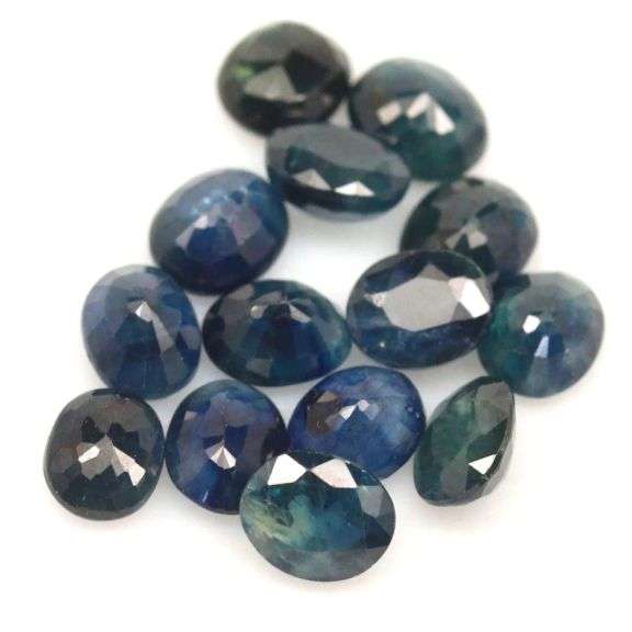 Beautifully colored 11.42ct midnight blue Sapphire set