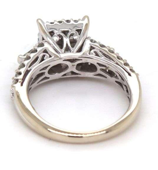 14kt White gold 1.25ctw Invisible set princess cut and round brilliant cut baguette ring