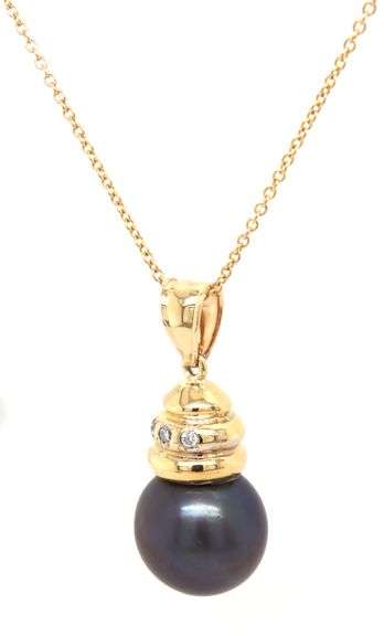 14kt Yellow gold 12mm Fresh water pearl and diamond accent pendant on chain