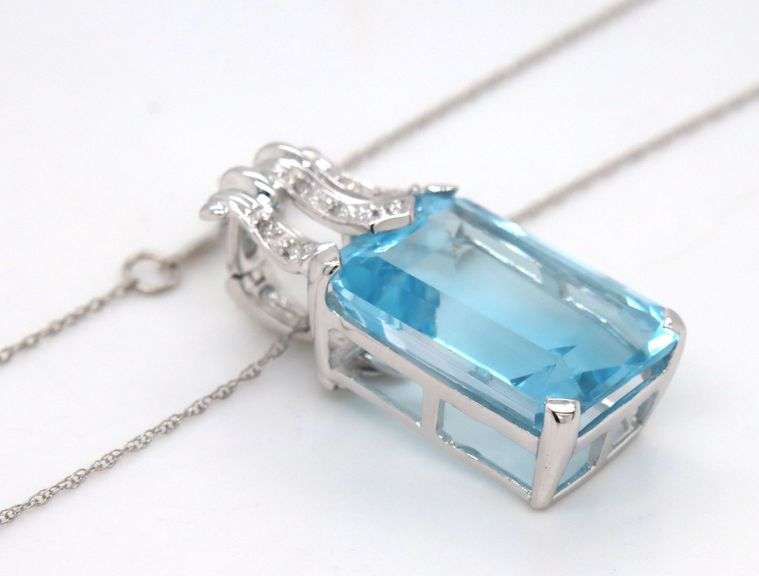 14kt White gold 17ctw blue topaz and diamond accent enhancer pendant on chain