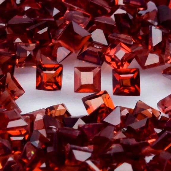 Heavy! 33.69ct reddish orange Garnet set!