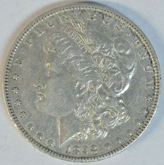 Scarce high end 1892-O Morgan Silver Dollar. XF/AU