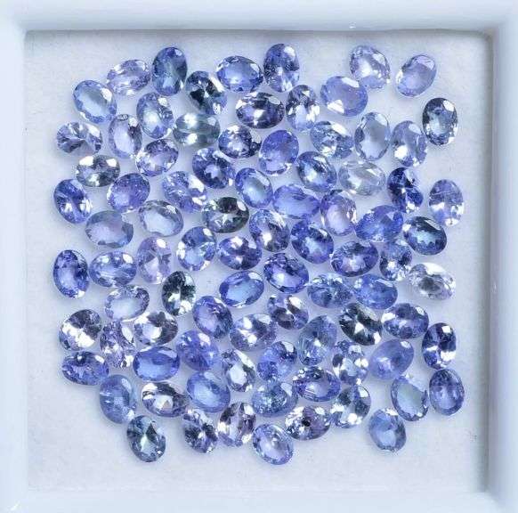 Untreated! Glittering 15.20ct oval cut Tanzanite set!