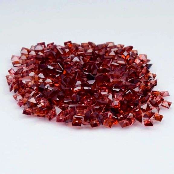 Heavy! 33.69ct reddish orange Garnet set!