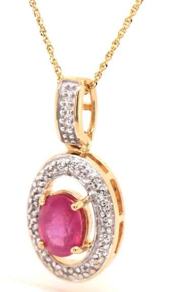 14kt Yellow gold 1.20ct oval ruby and diamond halo pendant on chain