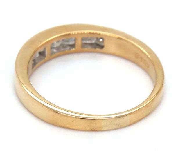 18kt Yellow gold 1.07ctw princess cut channel set diamond band