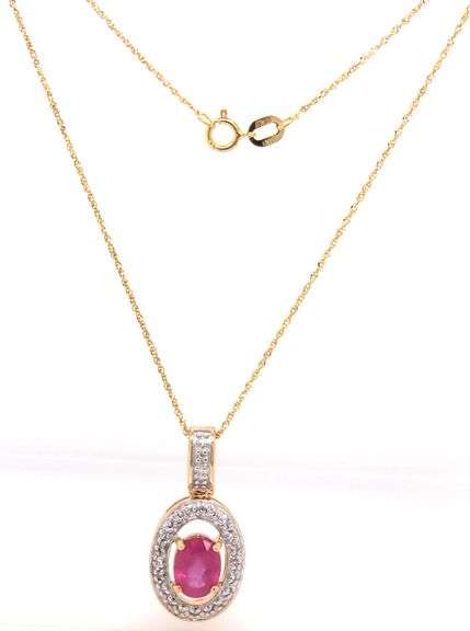 14kt Yellow gold 1.20ct oval ruby and diamond halo pendant on chain