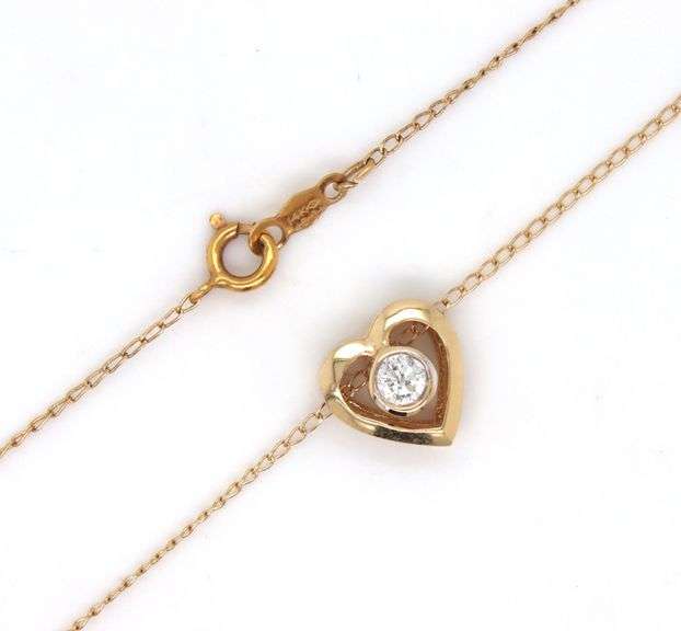 14kt Yellow gold 0.12ct bezel set diamond heart pendant on chain