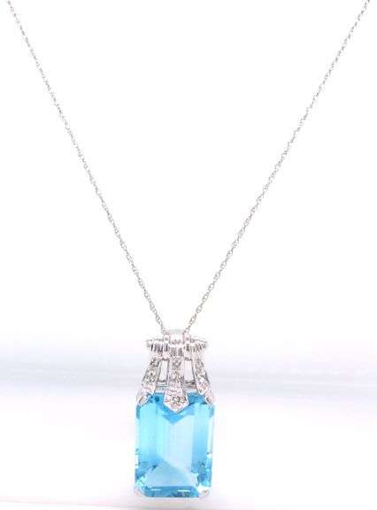 14kt White gold 17ctw blue topaz and diamond accent enhancer pendant on chain
