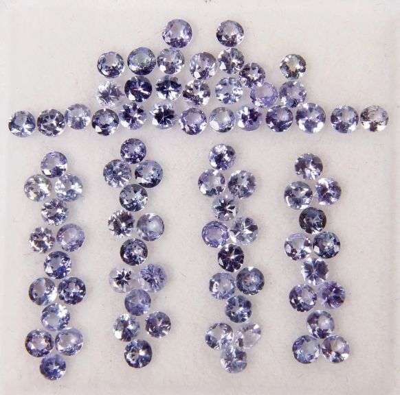 Untreated! Glittering 5.60ct round cut Tanzanite set!