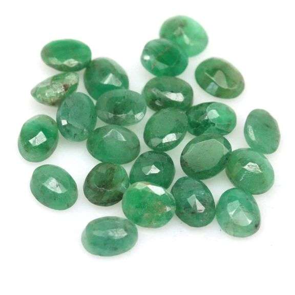 Bright emerald green 7.74ct 23pc Emerald set