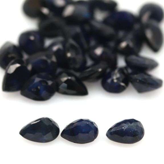 Heated only! 6.62ct cobalt blue Sapphire set from Madagascar