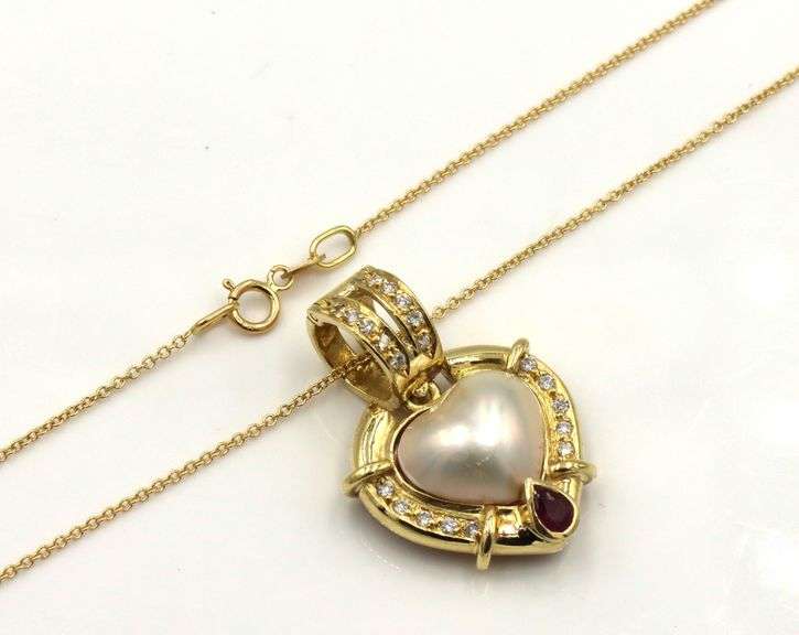 18kt Yellow gold heart shaped Mabe pearl and pear ruby and diamond accent enhancer pendant on chain